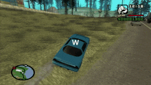 a blue car with the letter w on it