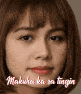 a close up of a woman 's face with the words makuha ka sa tingin on the bottom