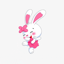 a cartoon bunny with a pink bow on its head