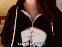 a woman in a black hoodie says take em off !!