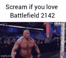 a man without a shirt is screaming while standing in a wrestling ring .