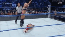 a wrestling match is being shown on the nextclothing live
