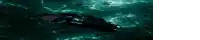 a blurred image of a person swimming in the ocean