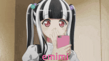 a girl with pigtails is holding a pink cell phone and the word emimi is on the bottom right