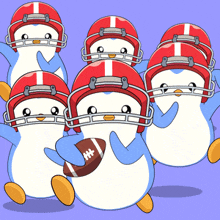 a group of penguins wearing red football helmets