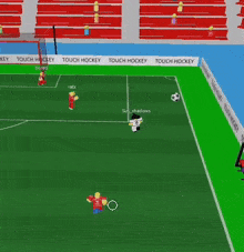 a soccer game is being played on a soccer field with a few players on it
