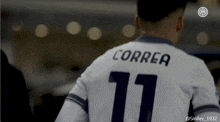 a man wearing a white jersey with correa 11 on the back