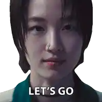 a close up of a woman 's face with the words let 's go below it