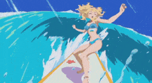 a girl in a bikini is riding a wave on a surfboard in the ocean