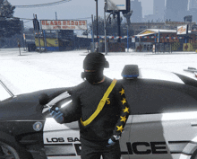 a man in a mask is standing in front of a police car