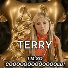 a woman is sitting in a gold chair with the words `` terry i 'm so cooo ! ''