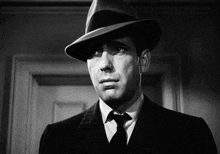 Bogart Stare Humphrey Bogart GIF - Bogart Stare Humphrey Bogart GIFs