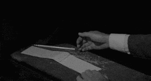 a black and white photo of a person 's feet
