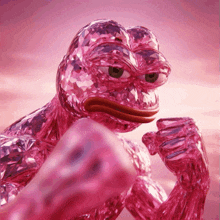 a pink frog with a fist in its mouth