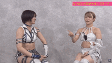 two women are standing next to each other and the word no is on the screen