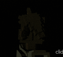 a pixel art of a man with a cone on his head and the words click below him