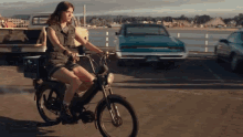 riding bicycle bicycle strolling traveling hailee steinfeld
