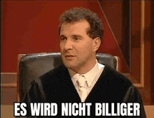 a man in a judge 's robe is sitting in a chair with the words es wird nicht billiger written below him