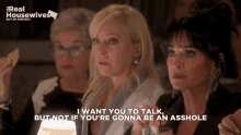 three women are sitting at a table with the words " i want you to talk but not if you re gonna be an asshole "