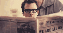Weezer Newspaper GIF - Weezer Newspaper Hmm GIFs
