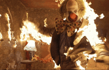 a clown with flames coming out of his head