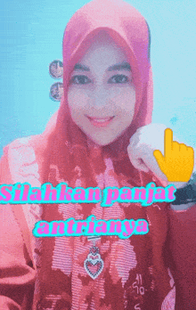 a woman wearing a pink hijab and a watch with the words silahkan panjat antaranya on the bottom