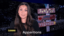 a woman with the name sammi in the walls behind her
