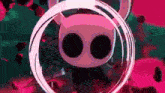 a cartoon character with horns and two eyes is surrounded by a circle .