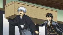 two anime characters are carrying a wooden coffin on their shoulders