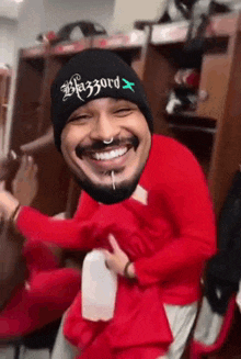 a man wearing a beanie that says blizzard on it