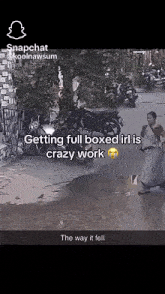 a snapchat screenshot of a woman walking down a street with the caption getting full boxed irl is crazy work