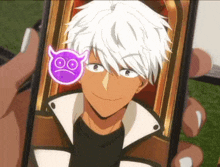 a person is holding a cell phone with a picture of a man with white hair and a devil sticker on his face .
