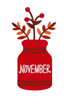 a red mason jar with leaves and berries says november