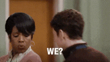 a man and a woman are talking to each other and the man is asking the woman if she is okay .