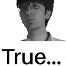 a black and white photo of a young man wearing glasses and the word true .