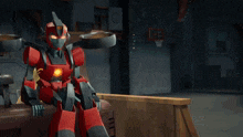 two robots are standing next to each other in front of a sign that says " free "