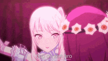 a pink anime girl with flowers in her hair is standing next to a purple anime girl .