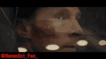 a close up of a man 's face with the name benedict fan written below it