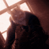 a cartoon tiger is holding a microphone in front of a window ..