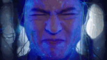 a close up of a person 's face with blue lights coming out of it