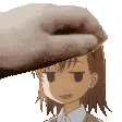 a hand is holding a cartoon character 's head .