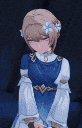 a girl with a flower in her hair wears a blue and white dress