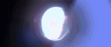a close up of a light coming out of a projector lens .