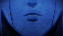 a close up of a person 's mouth with a blue background