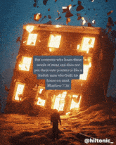 a man standing in front of a burning building with a bible verse from matthew 7:26