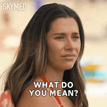 a woman says what do you mean in a gif