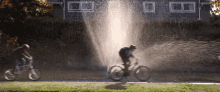 Biking Sprinklers GIF - Biking Sprinklers Squad GIFs