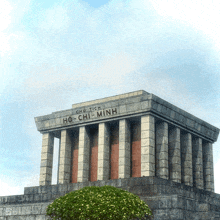 a building with the word ho-chi-minh on the top of it