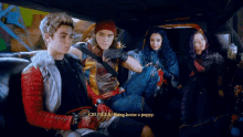 a group of people sitting in a car with the words cruella being home a puppy