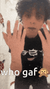 a person with their hands up and the words who gaf on the bottom right